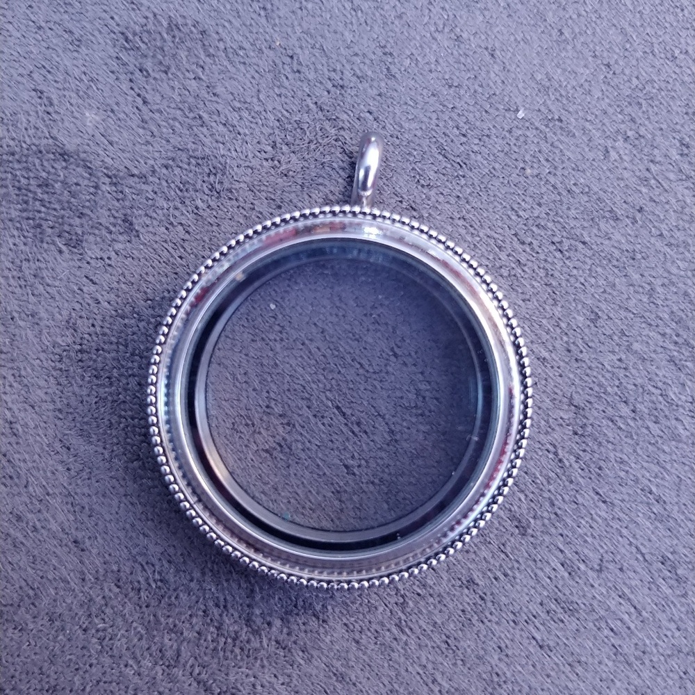 Origami owl locket pendant.